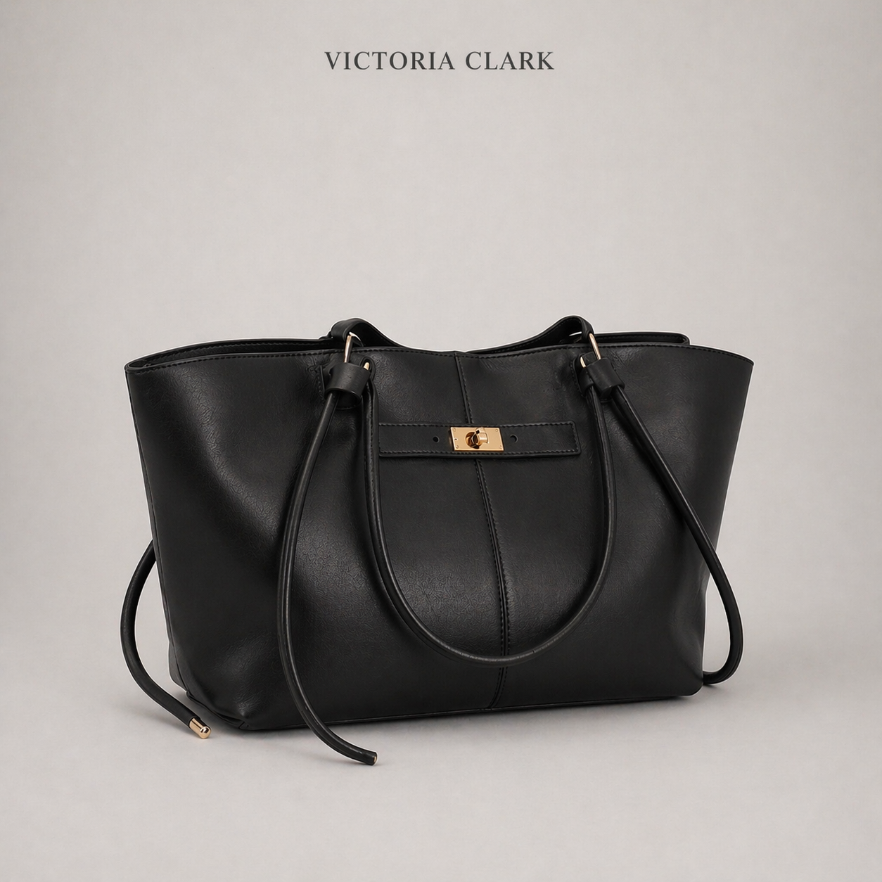 BOLSO SHOPPER ESTRUCTURADO CON DETALLE METÁLICO